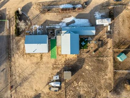 a kitchen with kitchen island a sink appliances and cabinets
