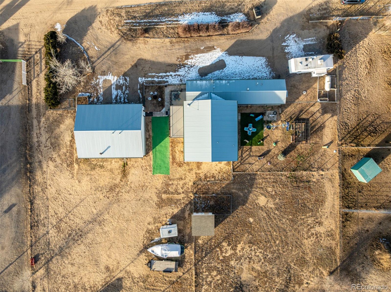 15528 Nancy Avenue Fort Lupton, CO 80621 - Photo 3 of 35 a view of a house with a yard