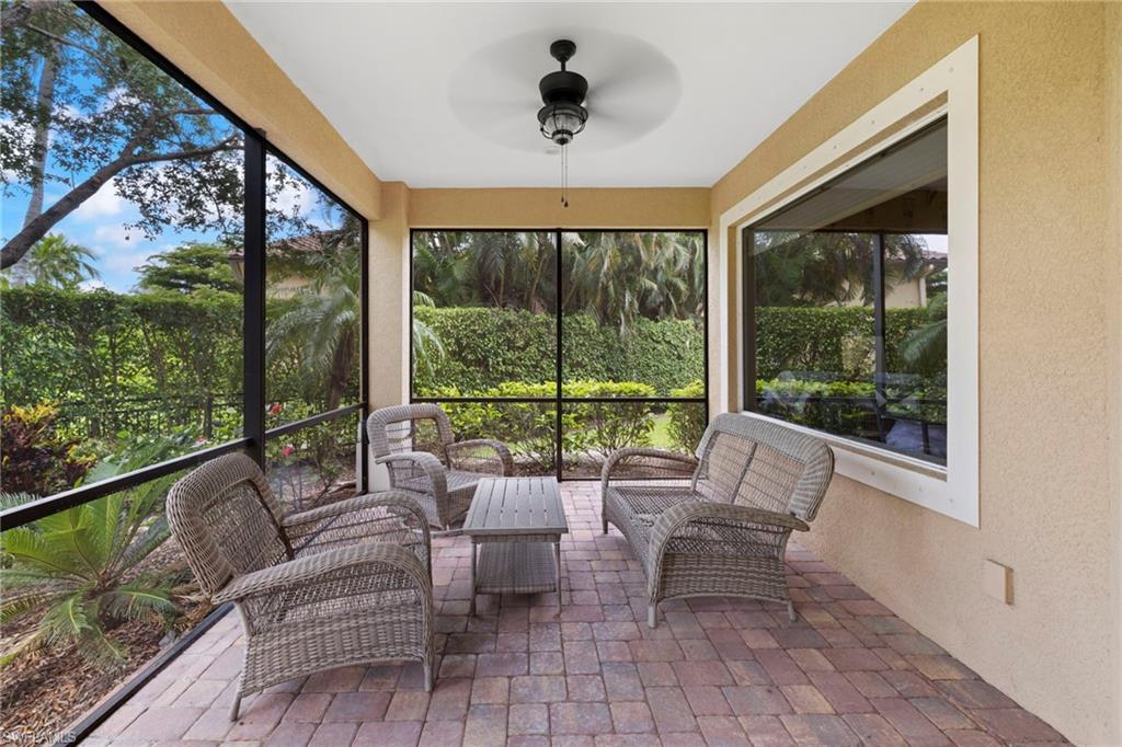 7834 Classics Drive Naples, FL 34113 - Photo 29 of 37 a living room with furniture and a window