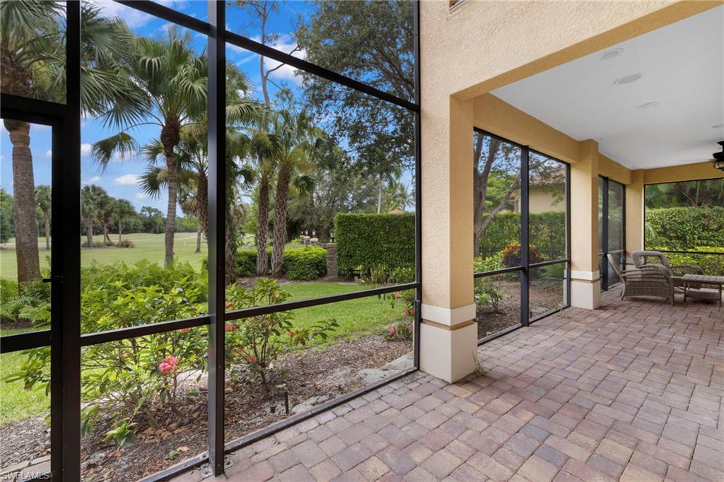 7834 Classics Drive Naples, FL 34113 - Photo 31 of 37 a house view with a outdoor space