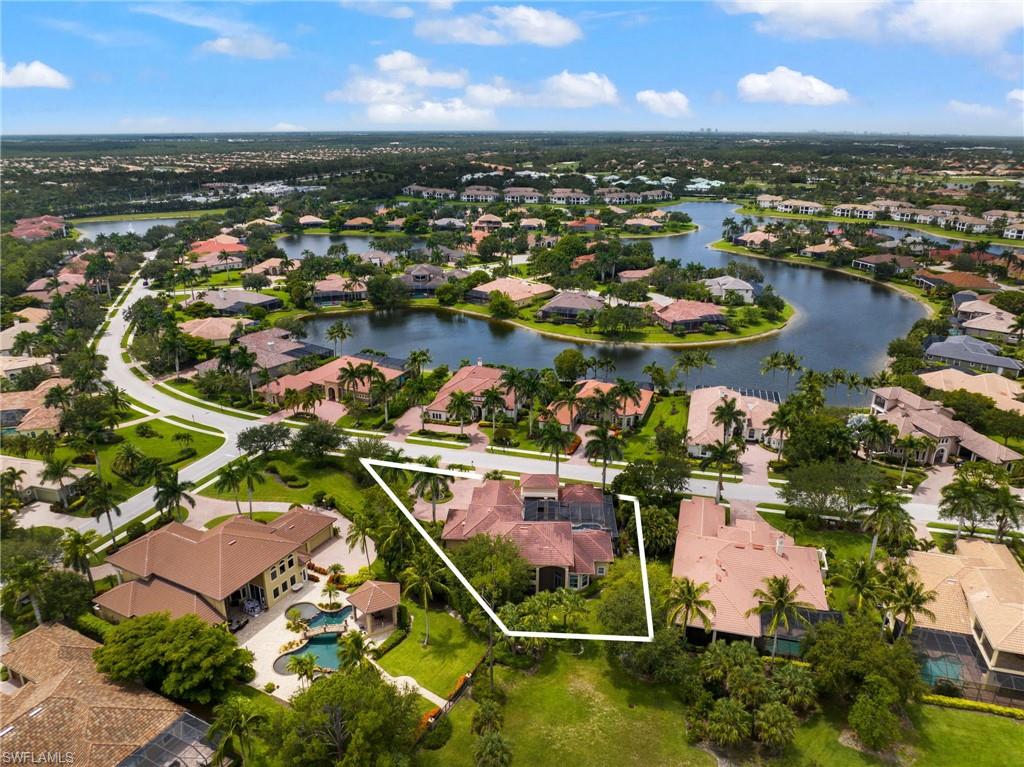 7834 Classics Drive Naples, FL 34113 - Photo 35 of 37 an aerial view of residential houses with outdoor space