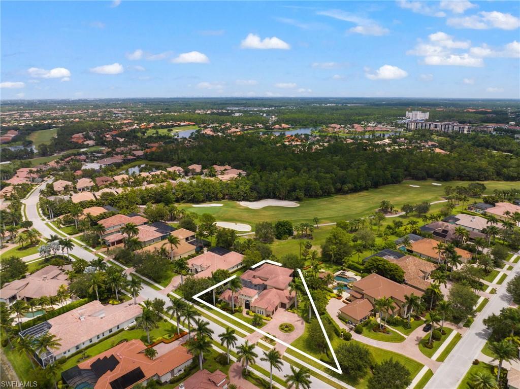 7834 Classics Drive Naples, FL 34113 - Photo 37 of 37 an aerial view of residential houses with outdoor space