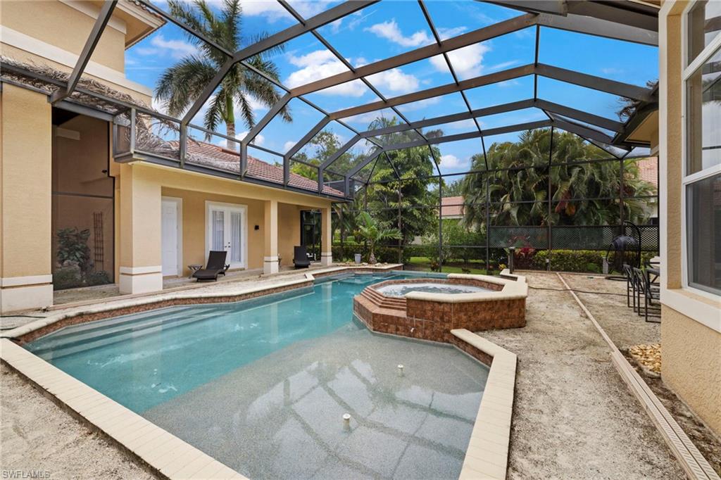 7834 Classics Drive Naples, FL 34113 - Photo 5 of 37 a view of a house with backyard and sitting area