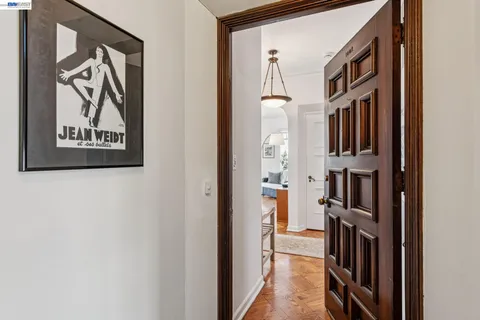 a view of a livingroom with furniture and staircase