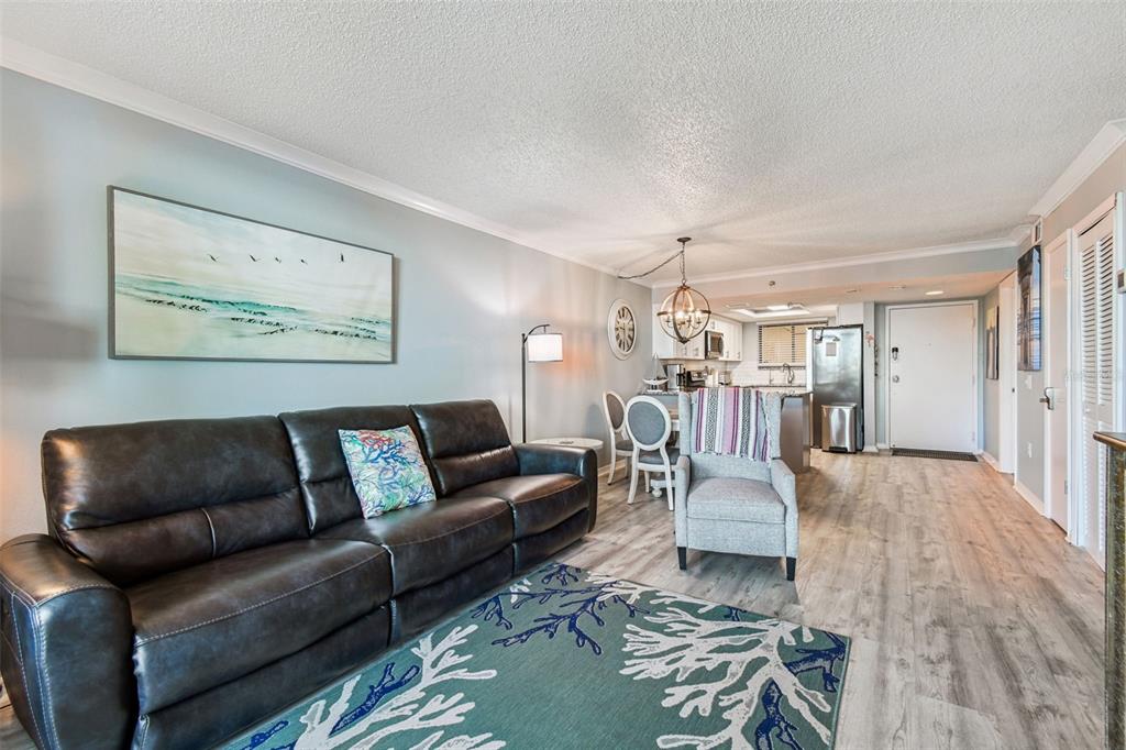 5915 Sea Ranch Drive, Unit 108 Hudson, FL 34667 - Photo 20 of 92 a living room with furniture and a wooden floor