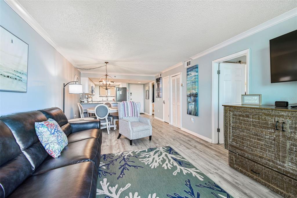 5915 Sea Ranch Drive, Unit 108 Hudson, FL 34667 - Photo 21 of 92 a living room with furniture and a flat screen tv