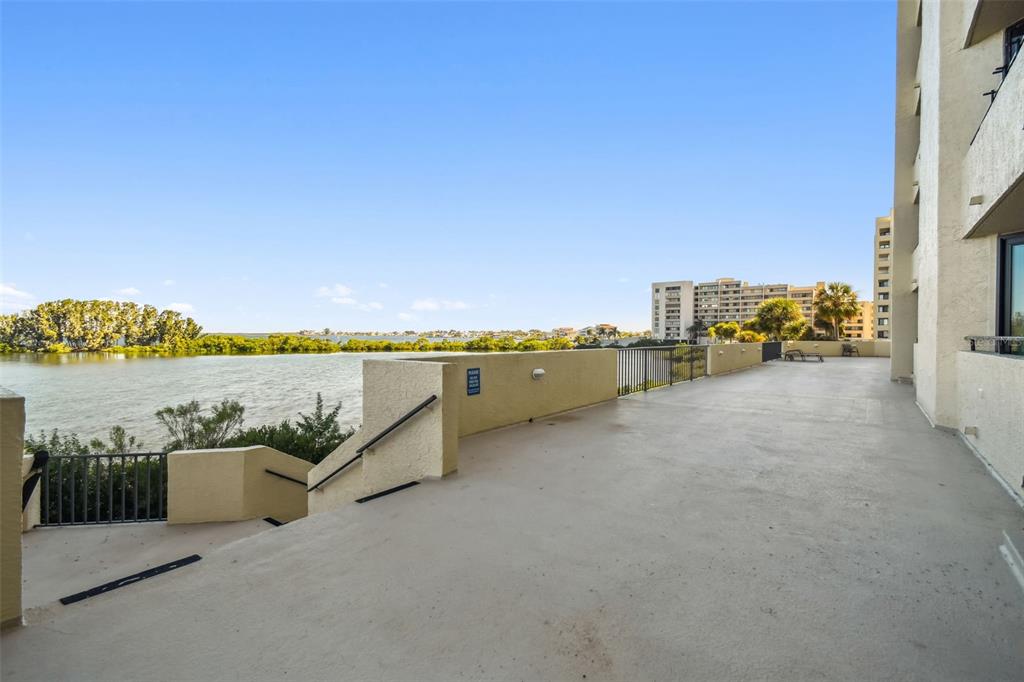 5915 Sea Ranch Drive, Unit 108 Hudson, FL 34667 - Photo 31 of 92 an outdoor view with a lake view