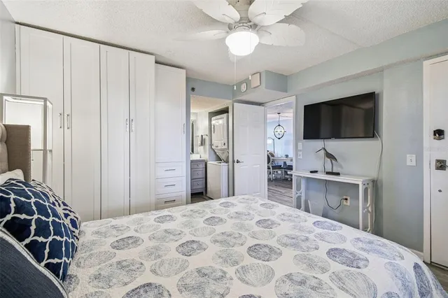 a view of a studio with dining room wooden floor and windows