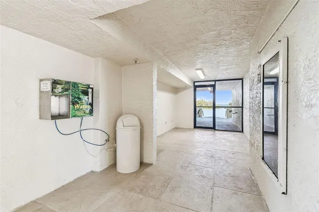a view of a balcony with wooden floor
