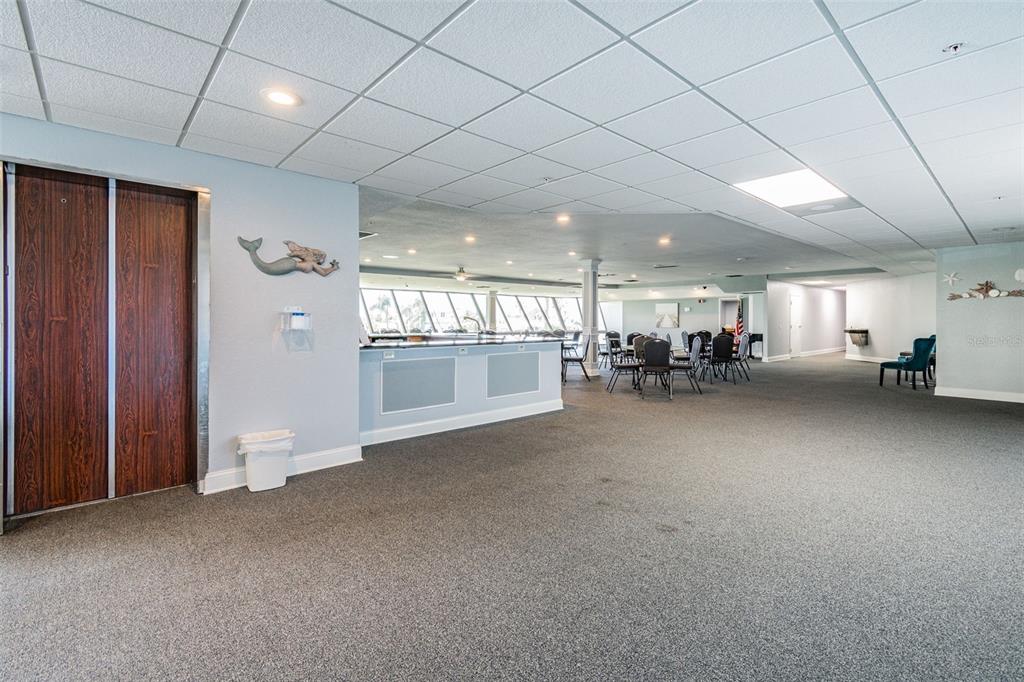 5915 Sea Ranch Drive, Unit 108 Hudson, FL 34667 - Photo 57 of 92 a view of a livingroom with furniture and a kitchen