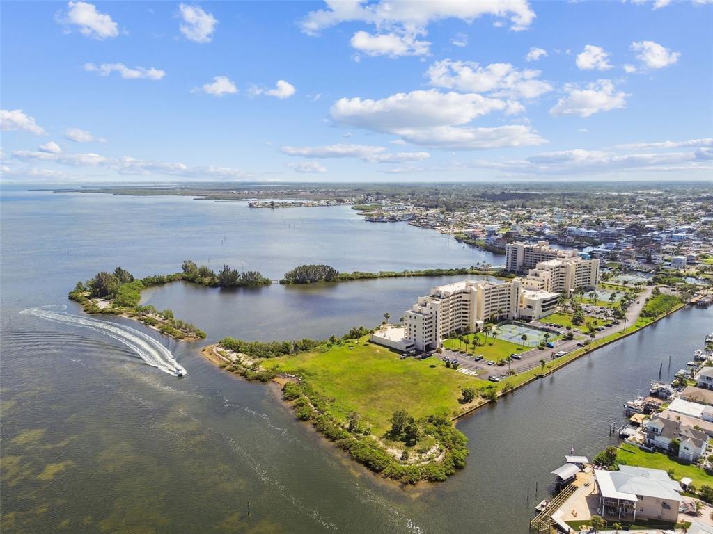 5915 Sea Ranch Drive, Unit 108 Hudson, FL 34667 - Photo 87 of 92 a view of a lake with a city