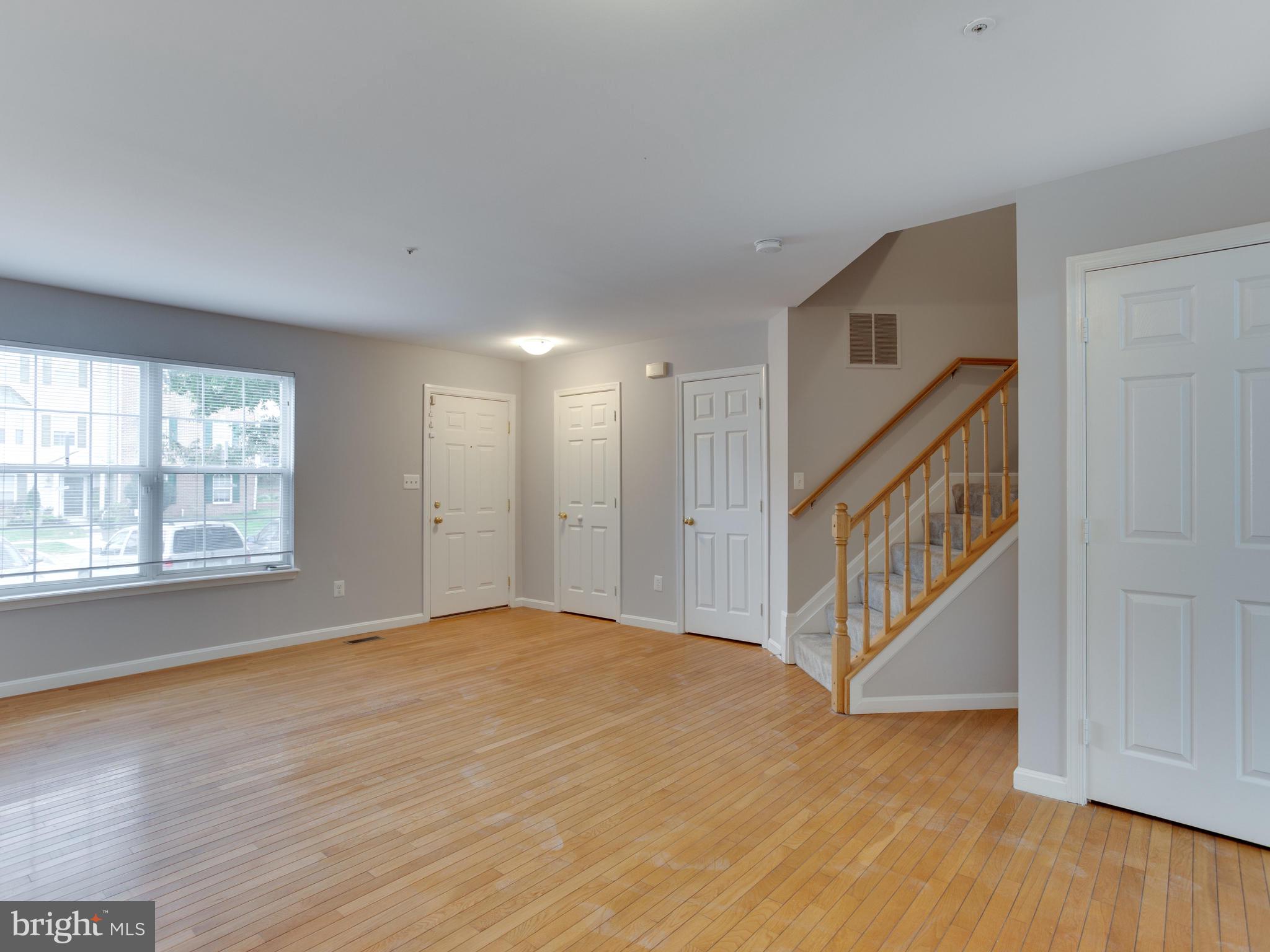 8723 Jarwood Road Baltimore, MD 21237 - Photo 11 of 43 Beautiful hardwoods floors in living room.
