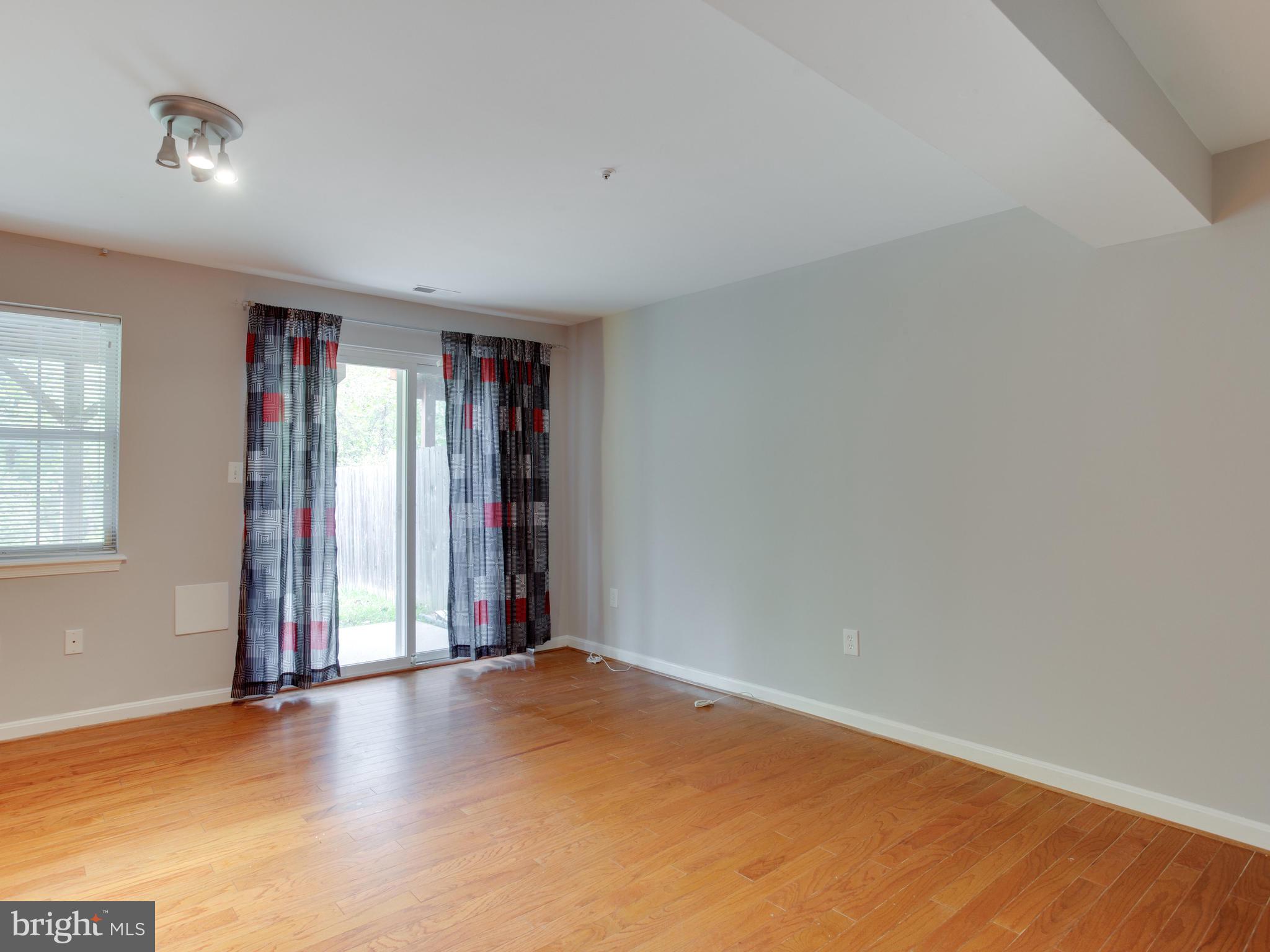 8723 Jarwood Road Baltimore, MD 21237 - Photo 27 of 43 Finished basement with sliding door