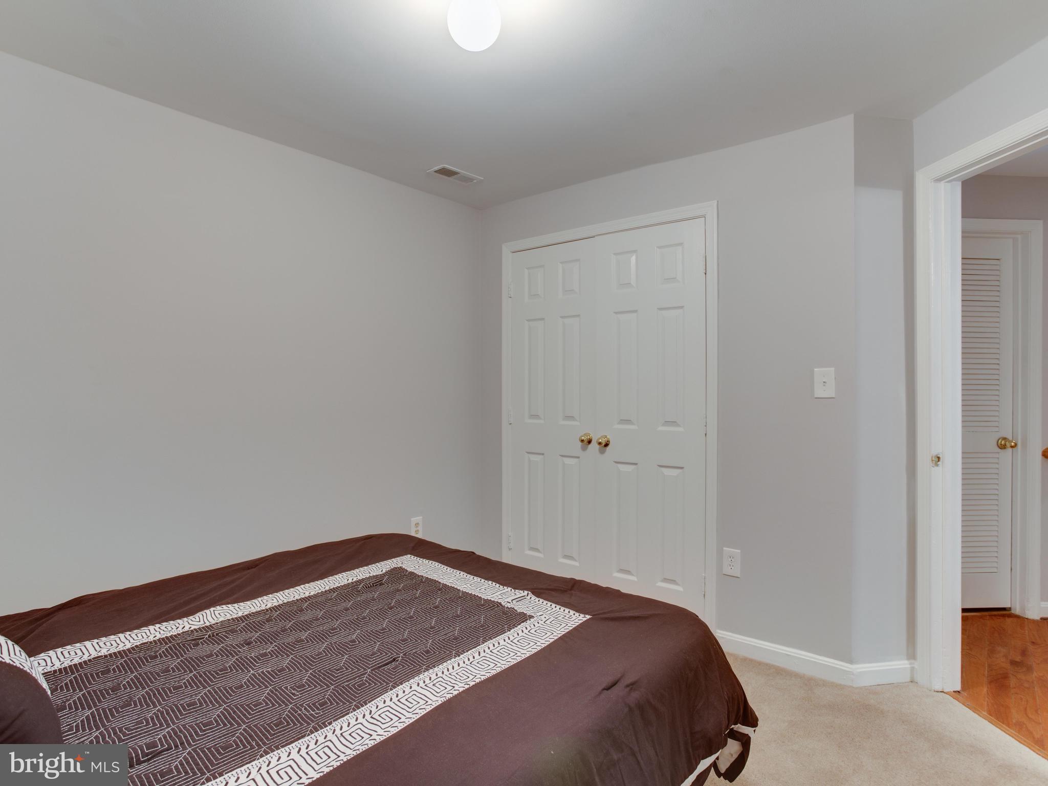 8723 Jarwood Road Baltimore, MD 21237 - Photo 30 of 43 Lower level bedroom