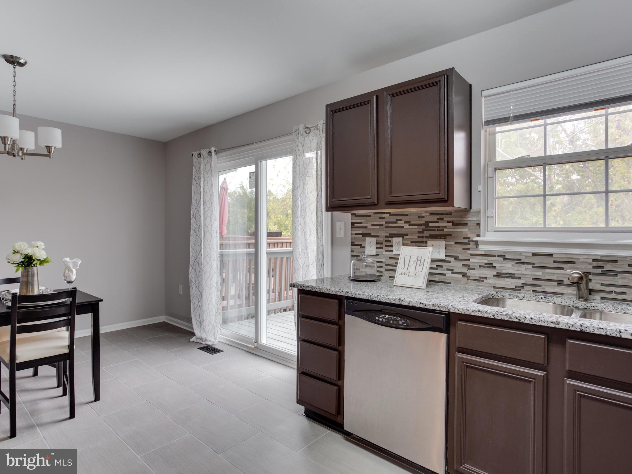 8723 Jarwood Road Baltimore, MD 21237 - Photo 7 of 43 Lge eat in kitchen with stainless steel appliances