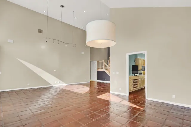 a view of a livingroom with wooden floor