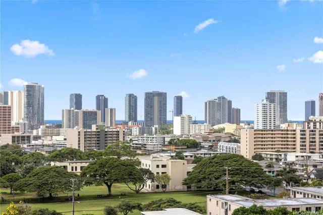 a view of a city with tall buildings
