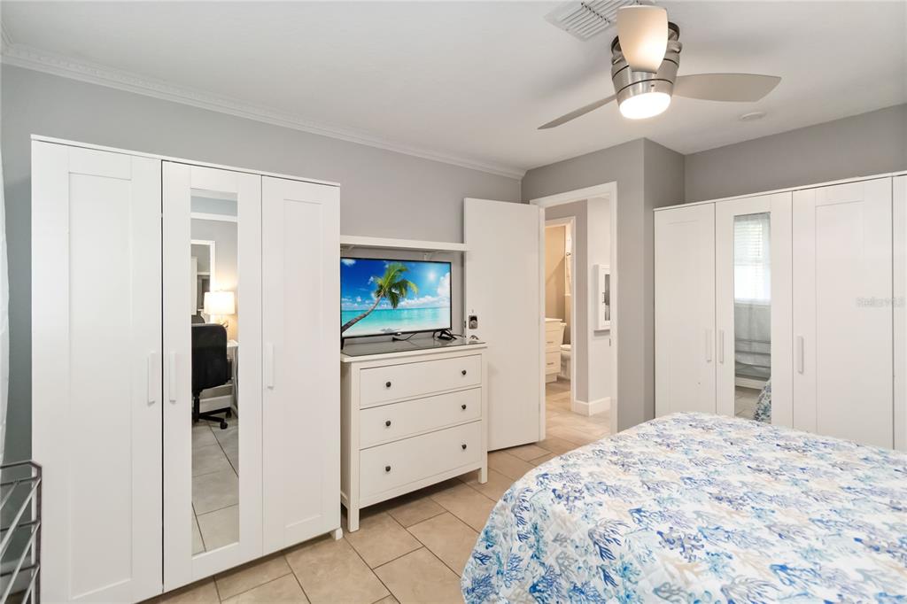 395 Piney Ridge Road Casselberry, FL 32707 - Photo 11 of 34 a bedroom with a bed and a dresser