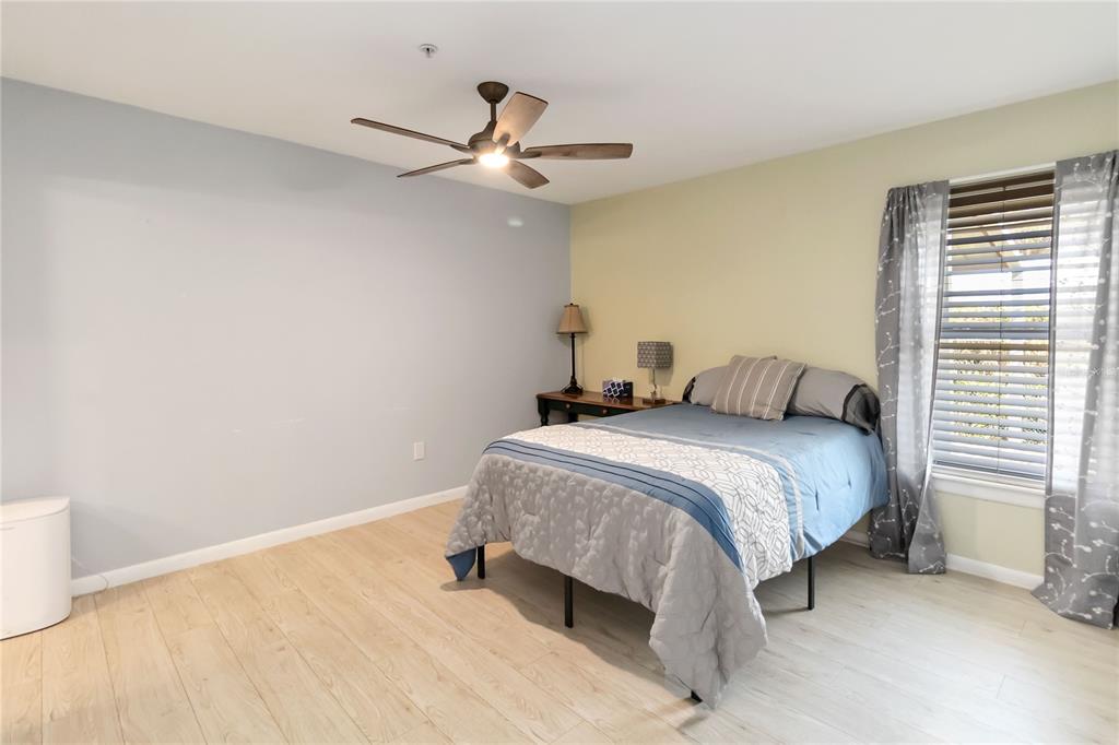 395 Piney Ridge Road Casselberry, FL 32707 - Photo 24 of 34 a bedroom with a bed and a window