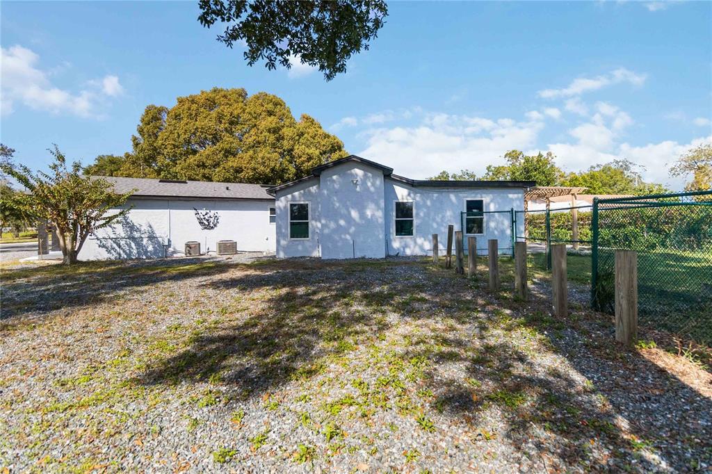 395 Piney Ridge Road Casselberry, FL 32707 - Photo 32 of 34 a view of a house with a yard