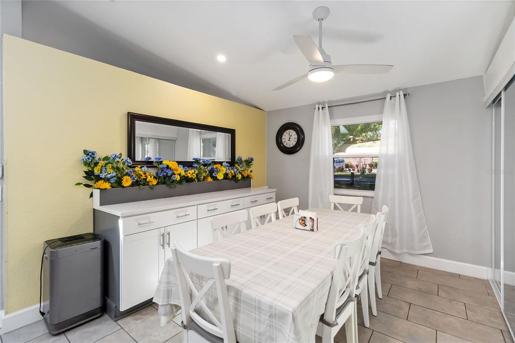 395 Piney Ridge Road Casselberry, FL 32707 - Photo 8 of 34 a view of a dining room with furniture and window