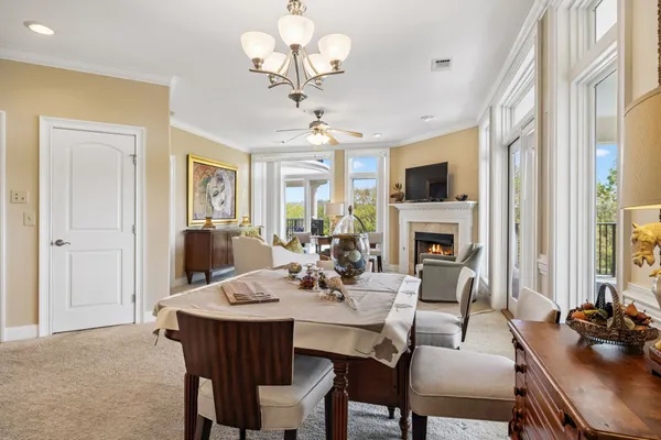 a kitchen with stainless steel appliances kitchen island granite countertop a sink and stove top oven