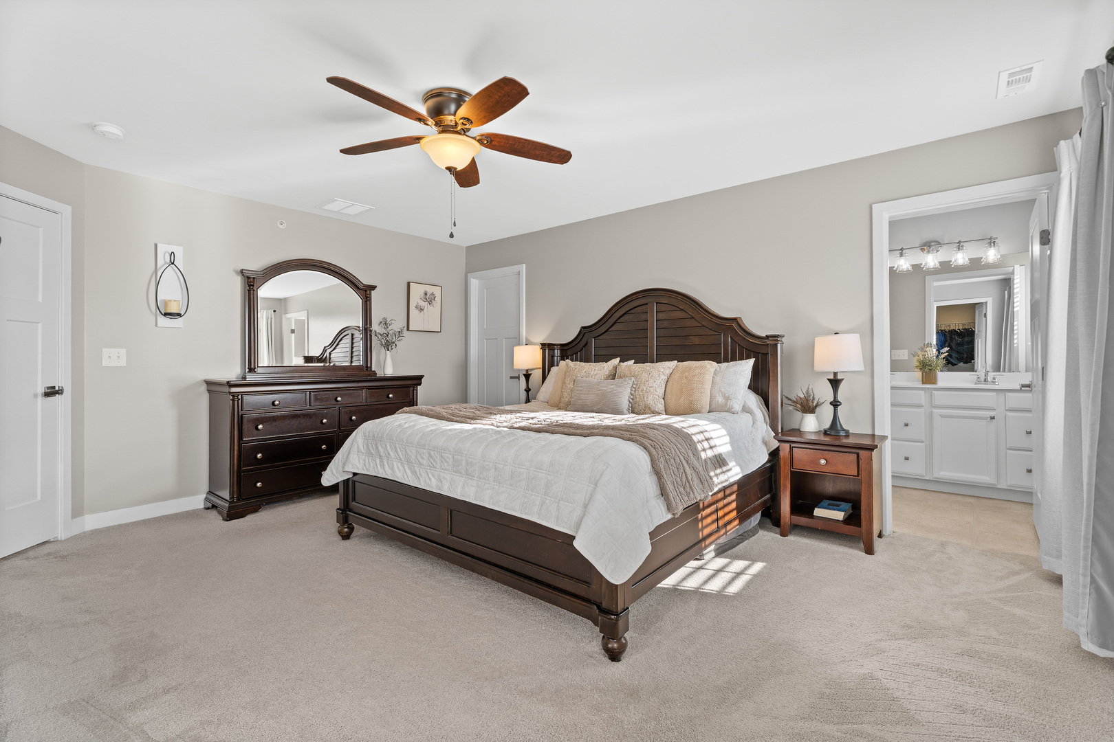 1053 Sears Circle Elburn, IL 60119 - Photo 14 of 31 a bedroom with a bed and a chandelier