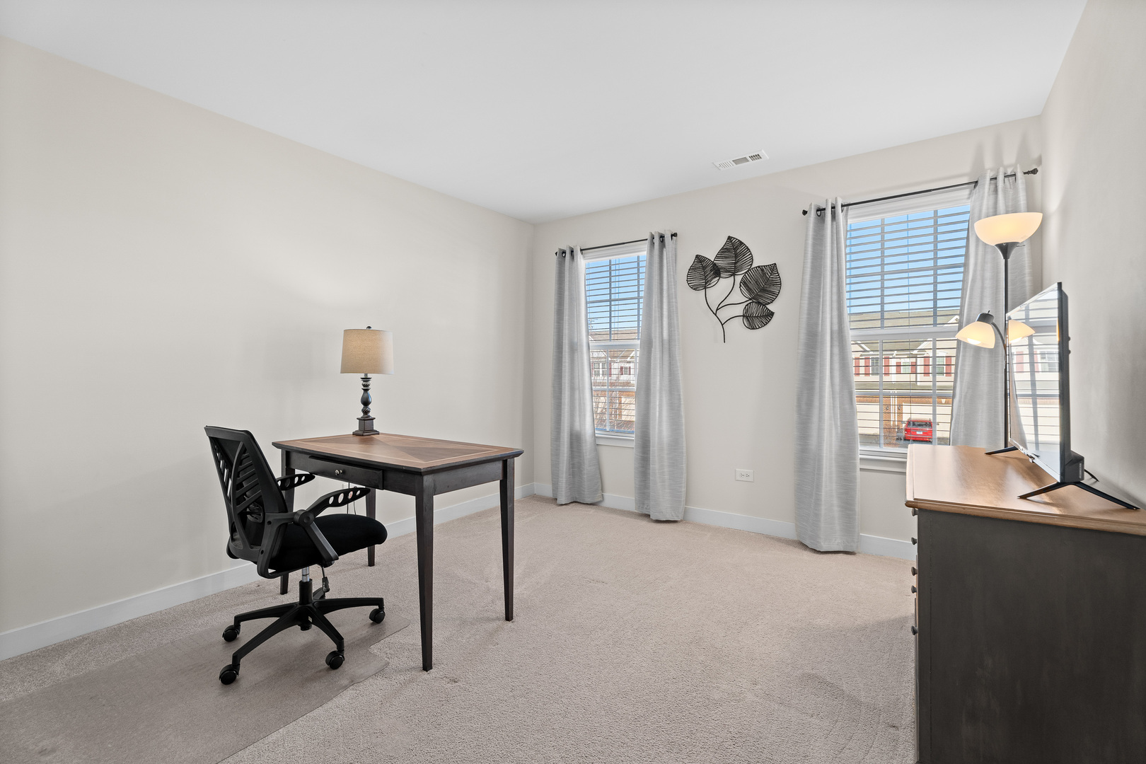 1053 Sears Circle Elburn, IL 60119 - Photo 17 of 31 a view of a workspace with furniture and a window