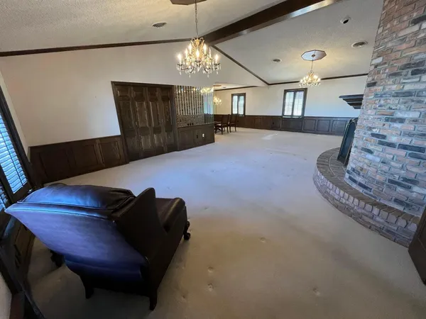 a view of a livingroom with a fireplace