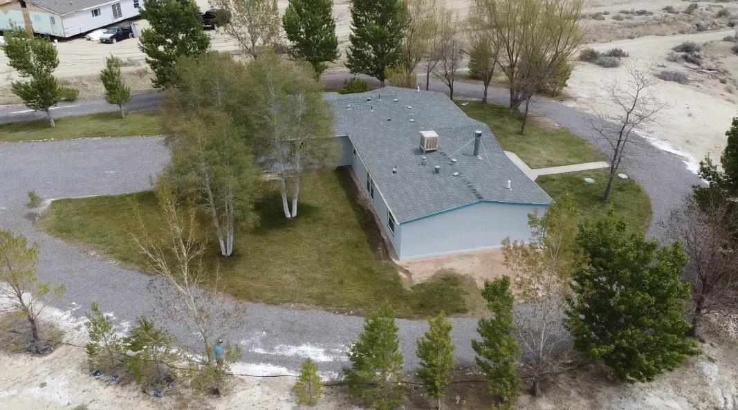 19548 B50 Road Delta, CO 81416 - Photo 34 of 37 an aerial view of a house with a yard
