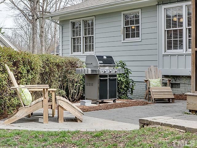 609 Ortega Road Raleigh, NC 27609 - Photo 15 of 25 a front view of a house with a yard