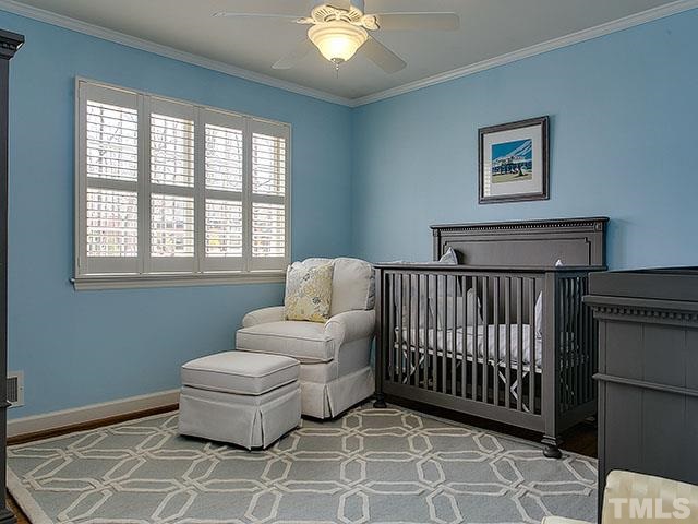 609 Ortega Road Raleigh, NC 27609 - Photo 17 of 25 a living room with furniture and a window