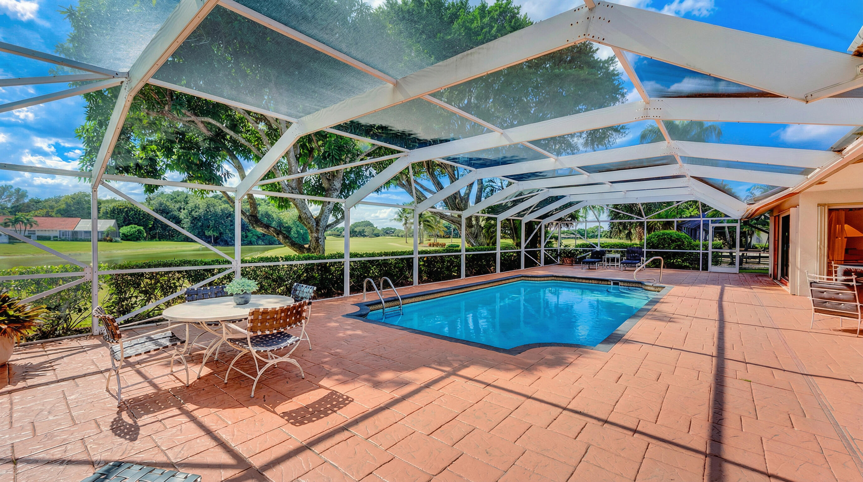 11229 Boca Woods Lane Boca Raton, FL 33428 - Photo 24 of 51 Pool and sitting area