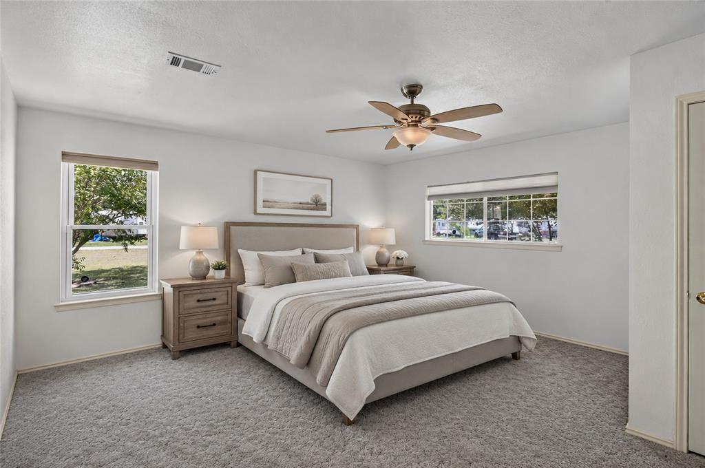 1612 Whitemound Road Sherman, TX 75090 - Photo 9 of 28 Carpeted room featuring light-colored walls and multiple windows (Virtually Staged)