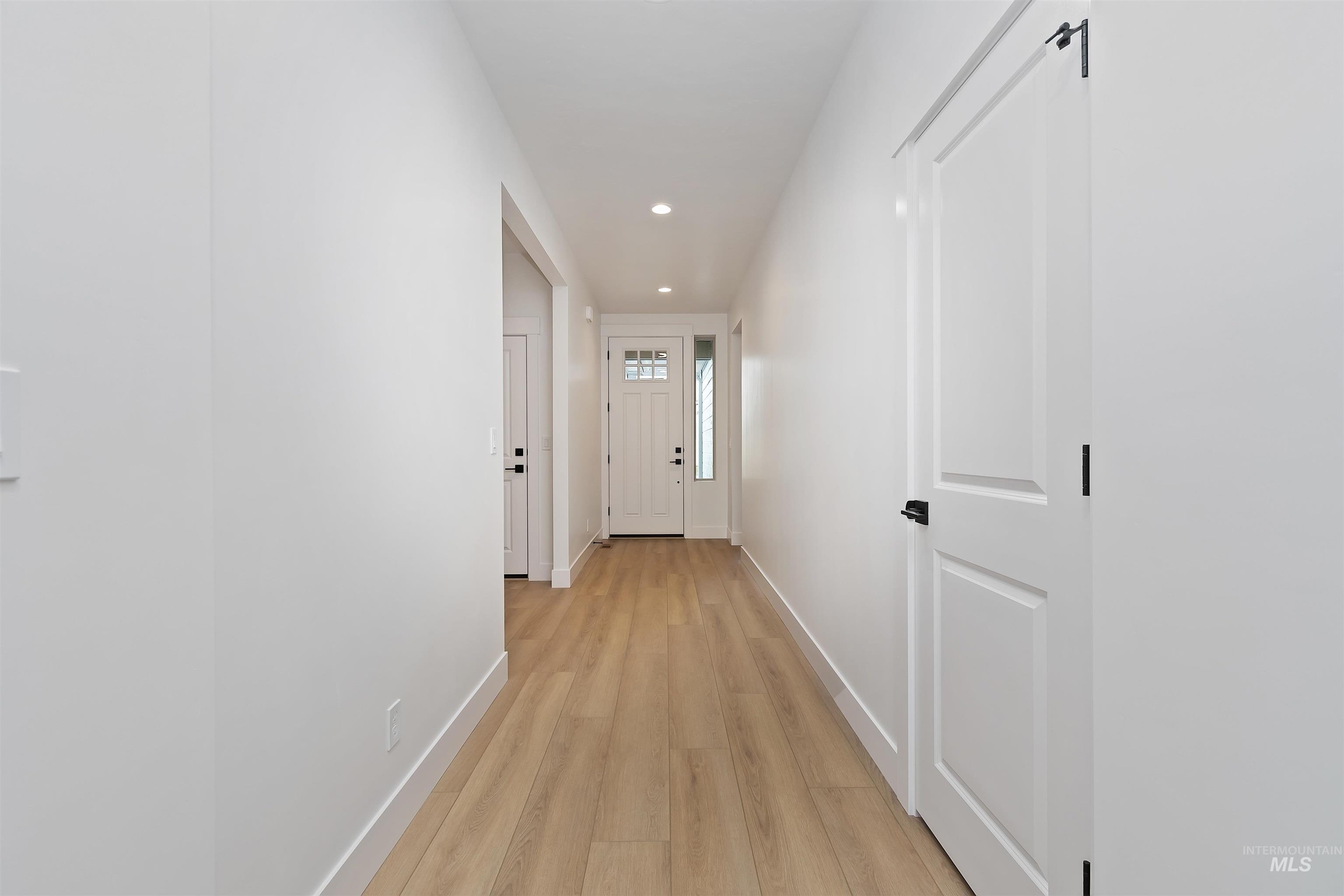 4302 Tropic Way Caldwell, ID 83607 - Photo 3 of 32 Hall with recessed lighting and light wood-style flooring