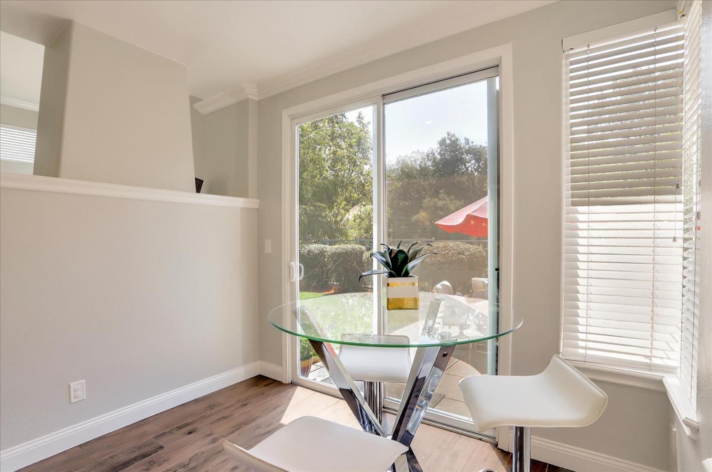 5889 Killarney Circle San Jose, CA 95138 - Photo 20 of 68 a view of a dining room with furniture and wooden floor