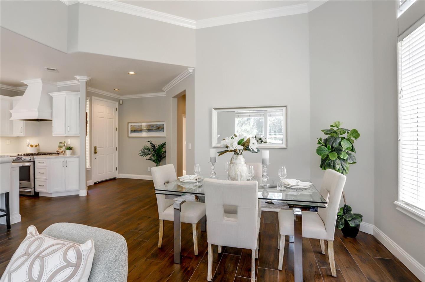 5889 Killarney Circle San Jose, CA 95138 - Photo 24 of 68 a view of a dining room with furniture and wooden floor