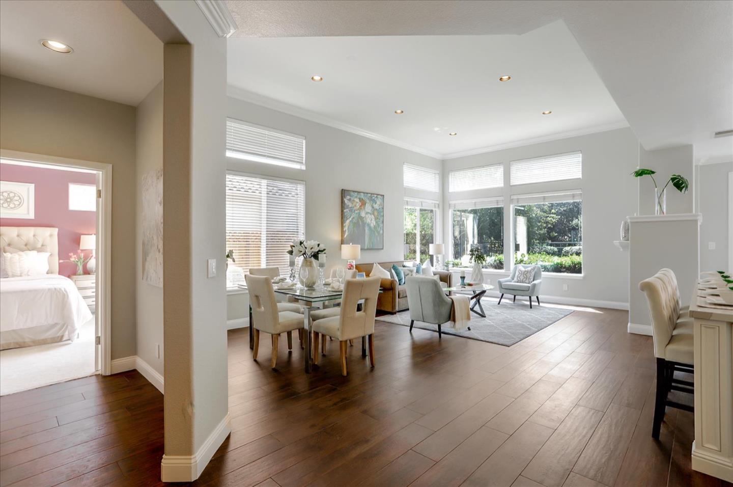 5889 Killarney Circle San Jose, CA 95138 - Photo 25 of 68 a living room with lots of furniture wooden floor and a large window