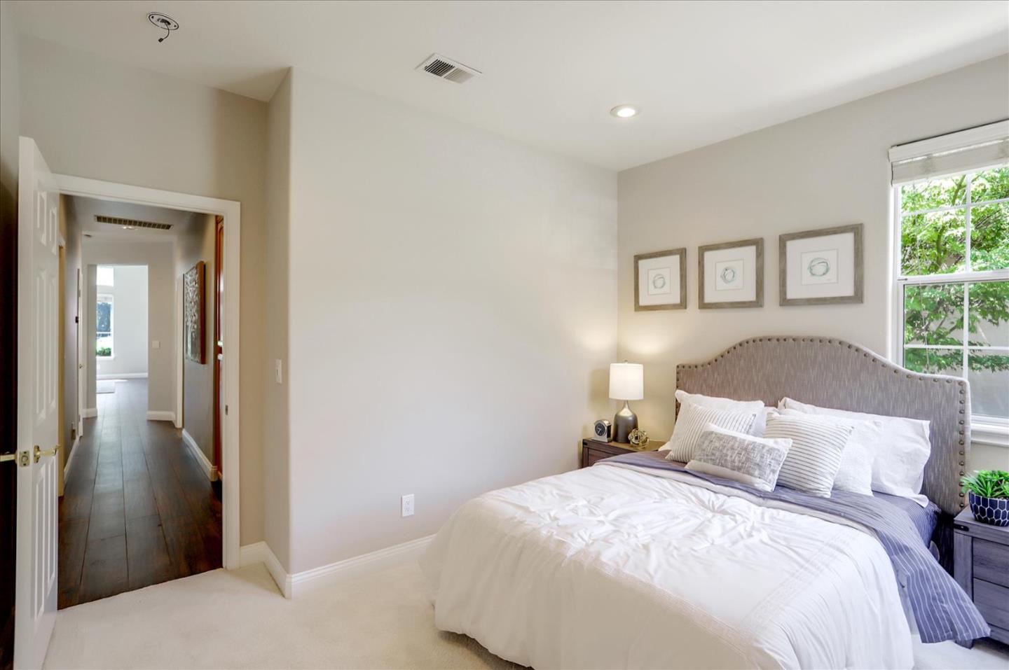 5889 Killarney Circle San Jose, CA 95138 - Photo 33 of 68 a bedroom with a bed and a large window
