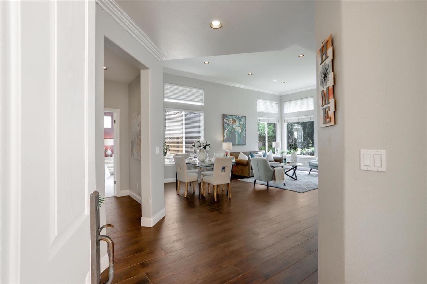 5889 Killarney Circle San Jose, CA 95138 - Photo 8 of 68 a living room with lots of furniture and a wooden floor