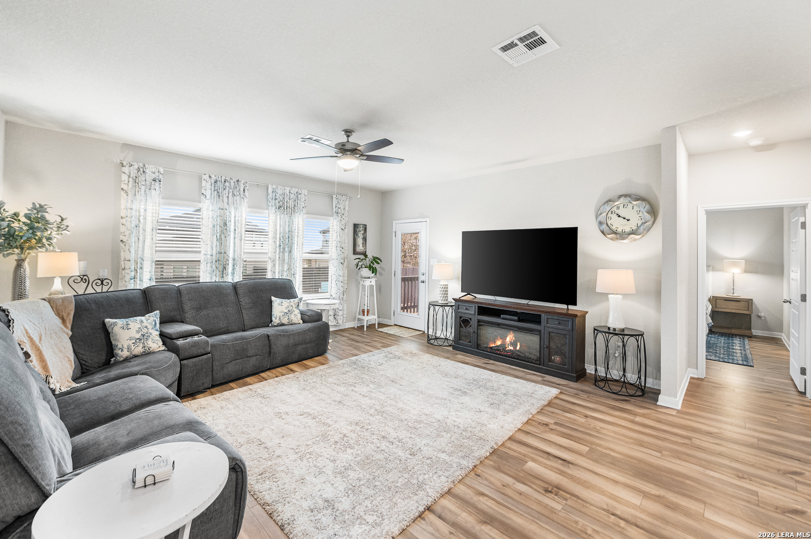 232 Colebrook Way Cibolo, TX 78108 - Photo 14 of 45 a living room with furniture and a flat screen tv