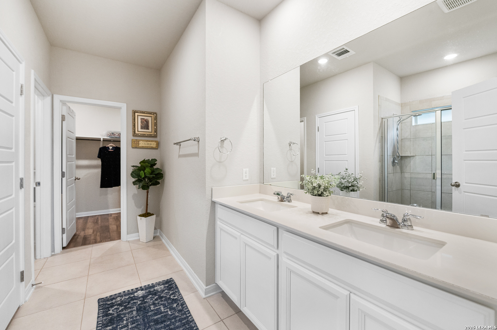 232 Colebrook Way Cibolo, TX 78108 - Photo 21 of 45 a bathroom with a sink and a mirror