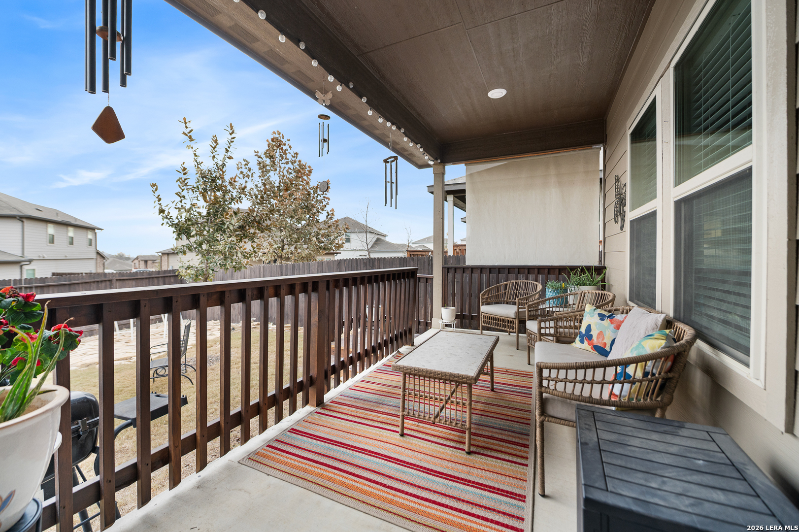 232 Colebrook Way Cibolo, TX 78108 - Photo 41 of 45 a balcony view with couple of chairs and a wooden floor
