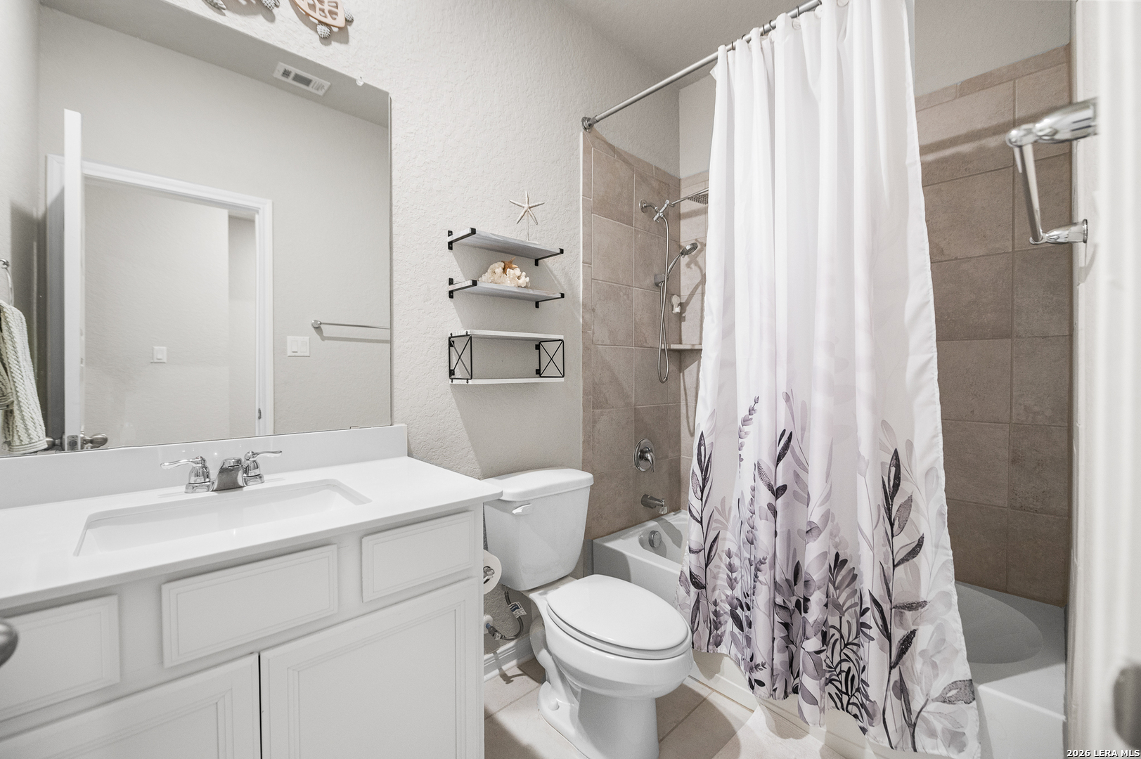 232 Colebrook Way Cibolo, TX 78108 - Photo 5 of 45 a bathroom with a sink toilet and shower