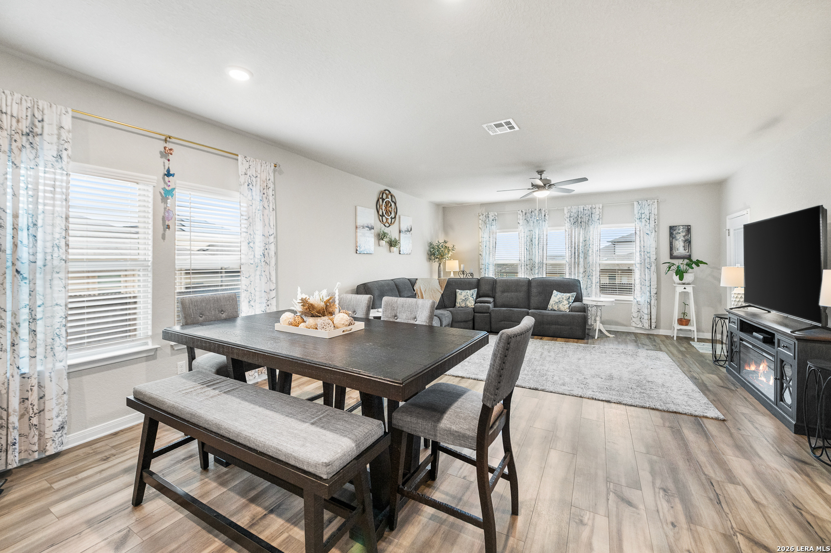 232 Colebrook Way Cibolo, TX 78108 - Photo 10 of 45 a view of a dining room with furniture window and wooden floor