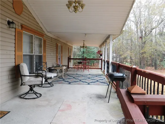 a view of a yard with a large trees