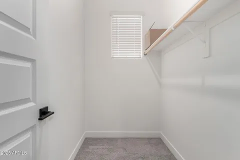 a view of a room with a window