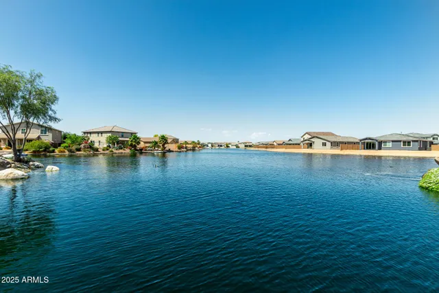 a view of a lake with a park