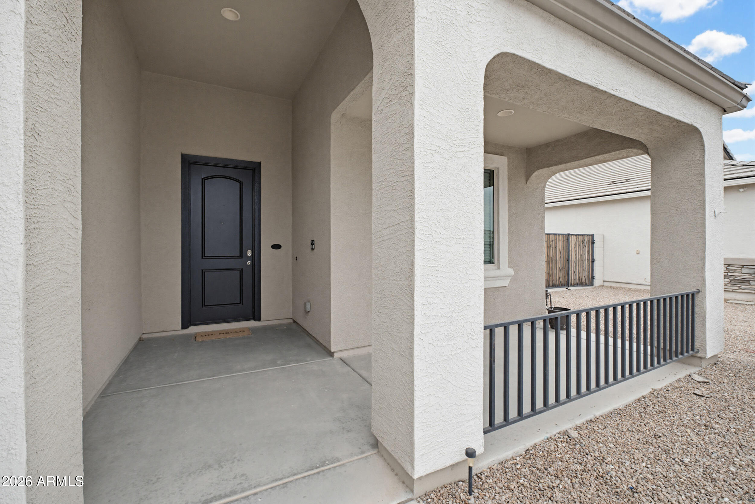 19995 North Ben Court Maricopa, AZ 85138 - Photo 3 of 51 a view of a hallway with wooden floor and stairs