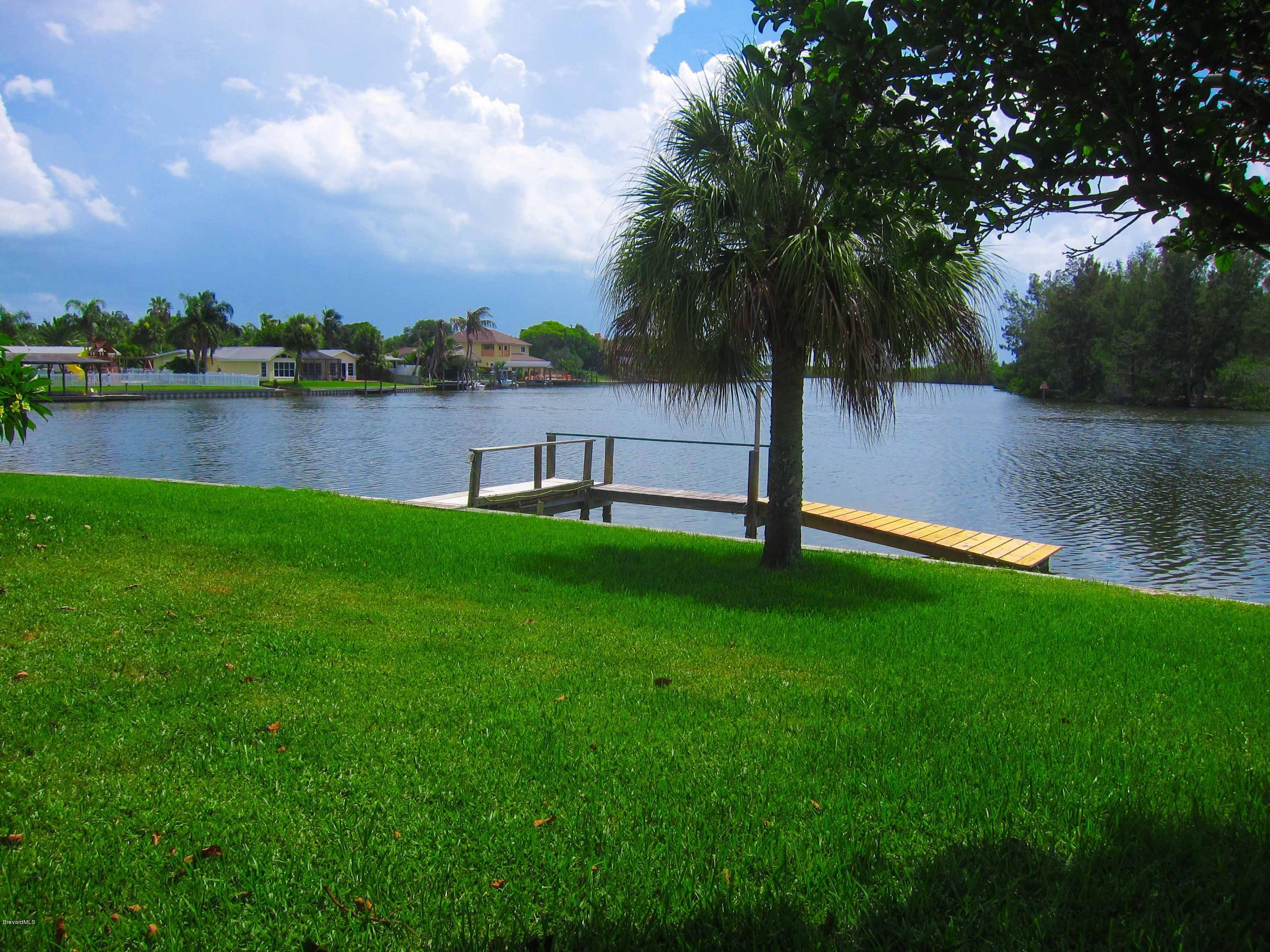 1215 Samar Road Cocoa Beach, FL 32931 - Photo 3 of 12 backyard with dock